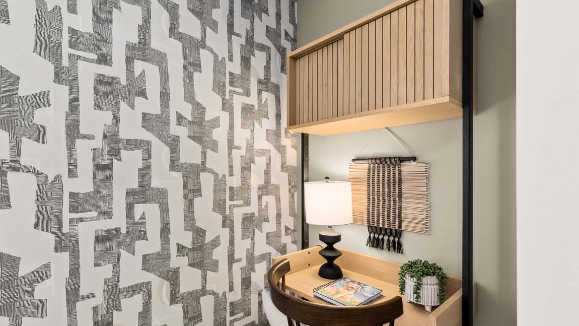 Closer view of the desk area located beside the closet in the upstairs bedroom of the Bennett model home