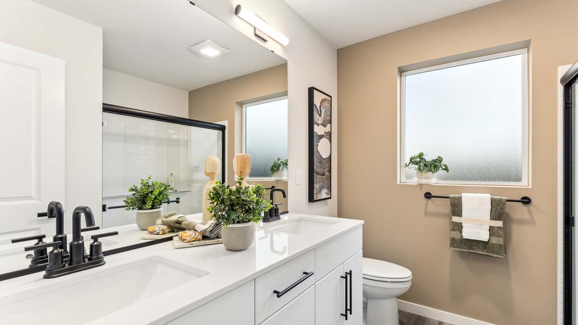 Primary Bathroom with 2 sink vanity and large step in shower