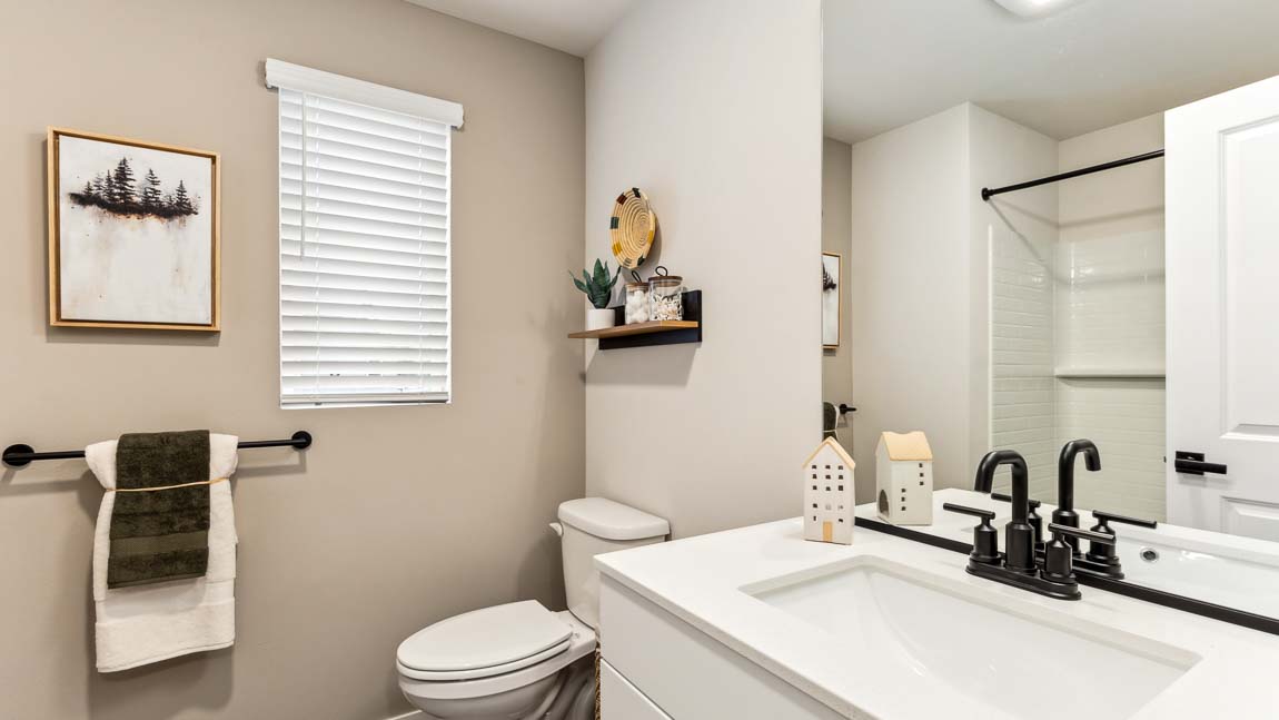 Bathroom with built-in shower tub combo in upper ﬂoor