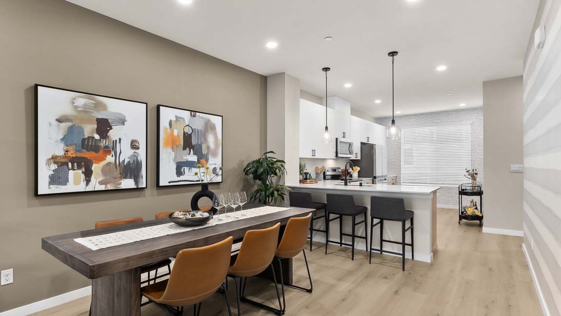 Open concept floor plan showing easy access between dining area and kitchen