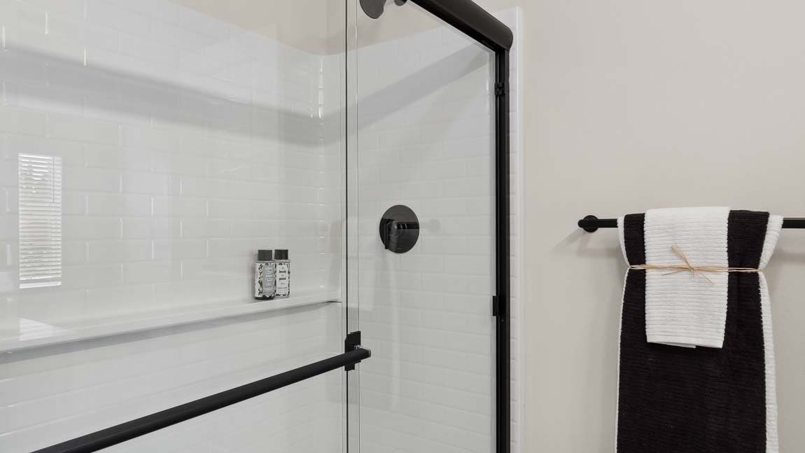 Generously sized built-in shower sliding door
