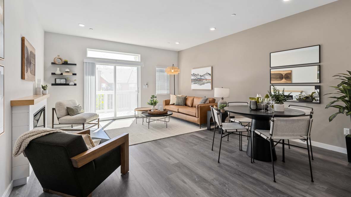 Dining and living room spaces open to kitchen area
