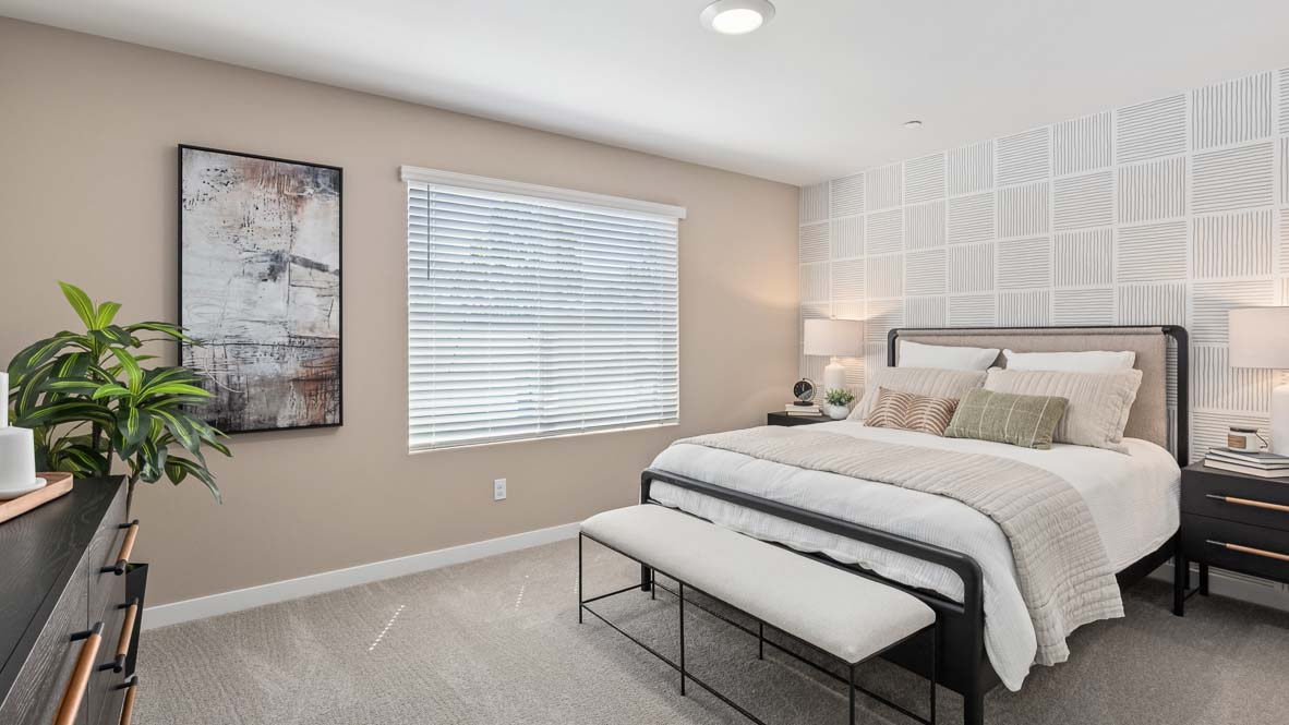 Closer view of bedroom in the private bedroom suite located at the rear of the home