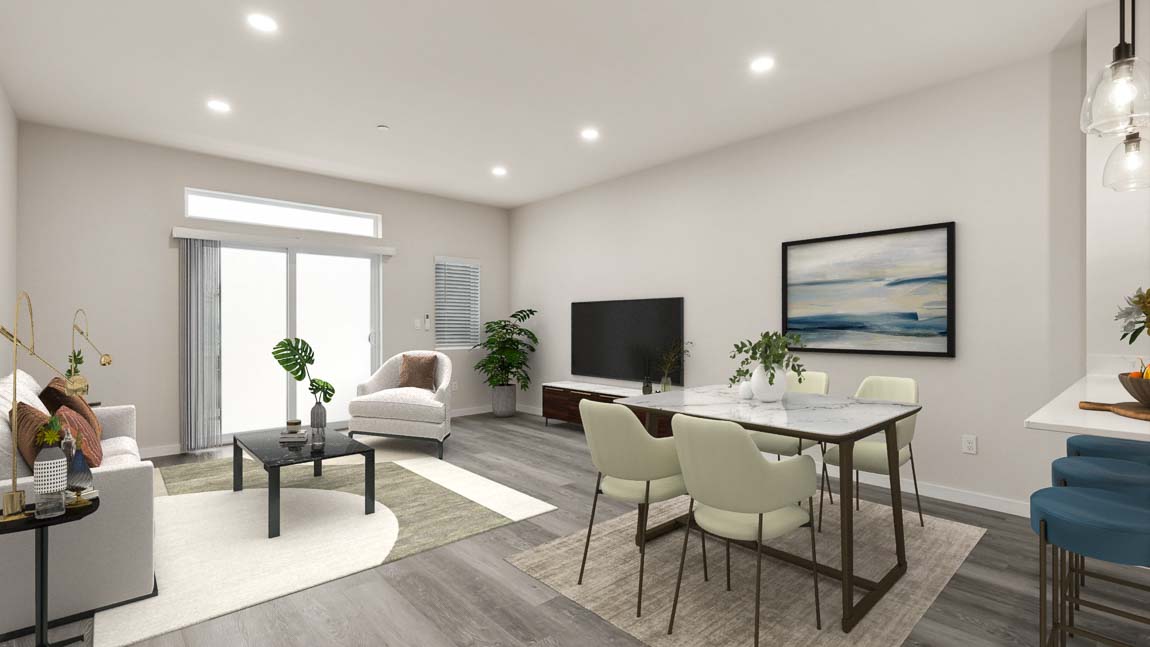 Dining room and living area with access to outdoor deck