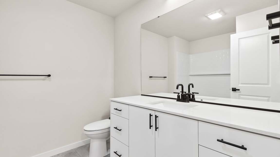 Large counterspace in hall bath near Bed 2