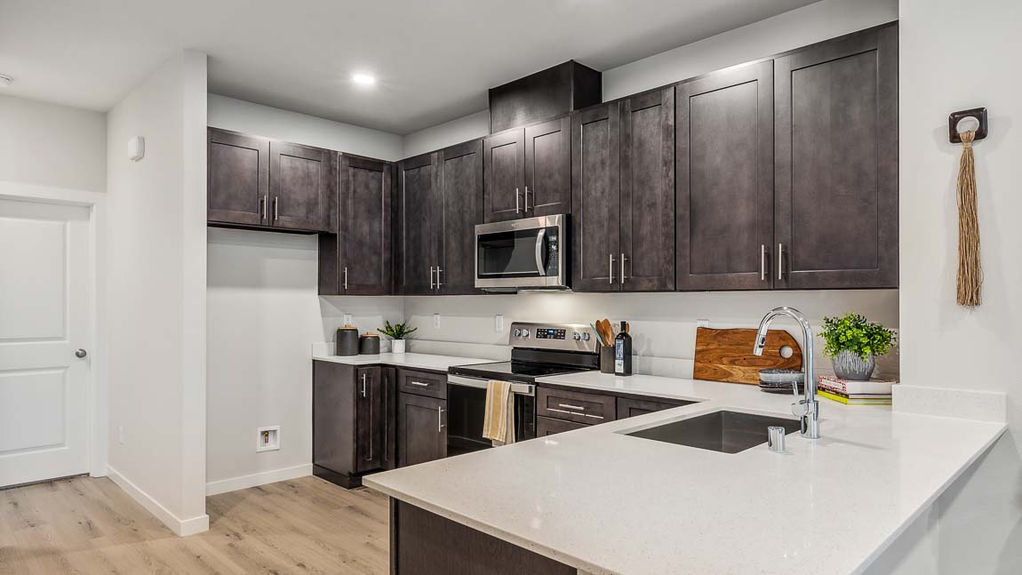 Another view of kitchen in townhome at The Alder