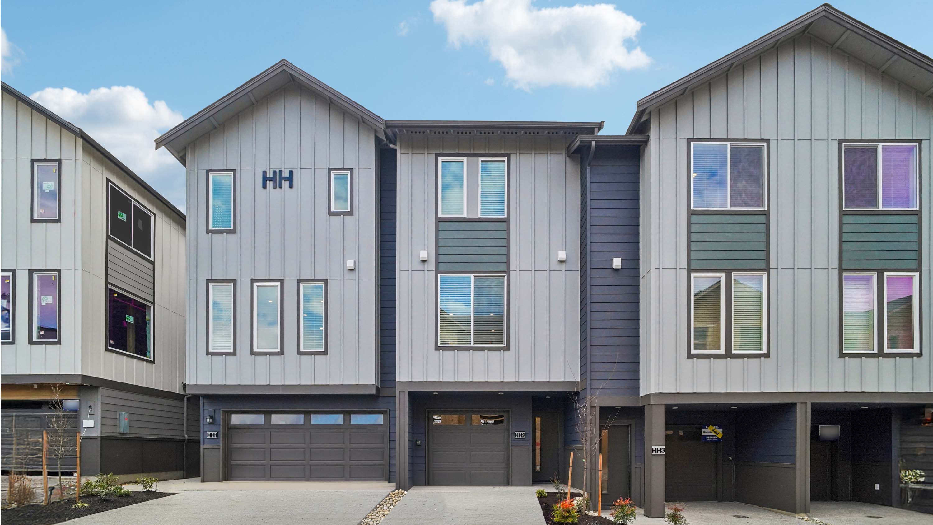 blue-grey townhome building