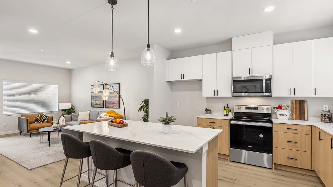 View into kitchen and living from the dining space