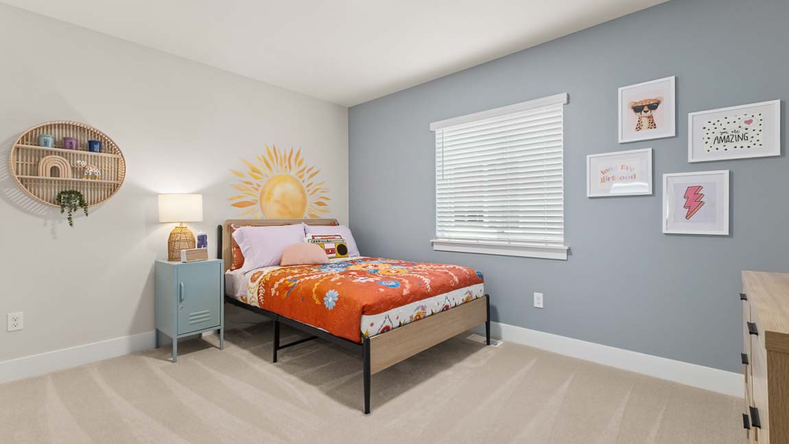 Third upper floor bedroom with plush carpeting next to secondary bathroom