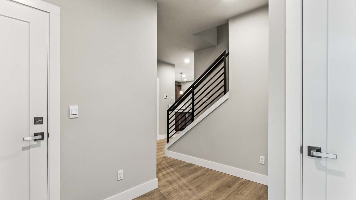 Entry of Rainier floor plan flowing access to garage and entry closet