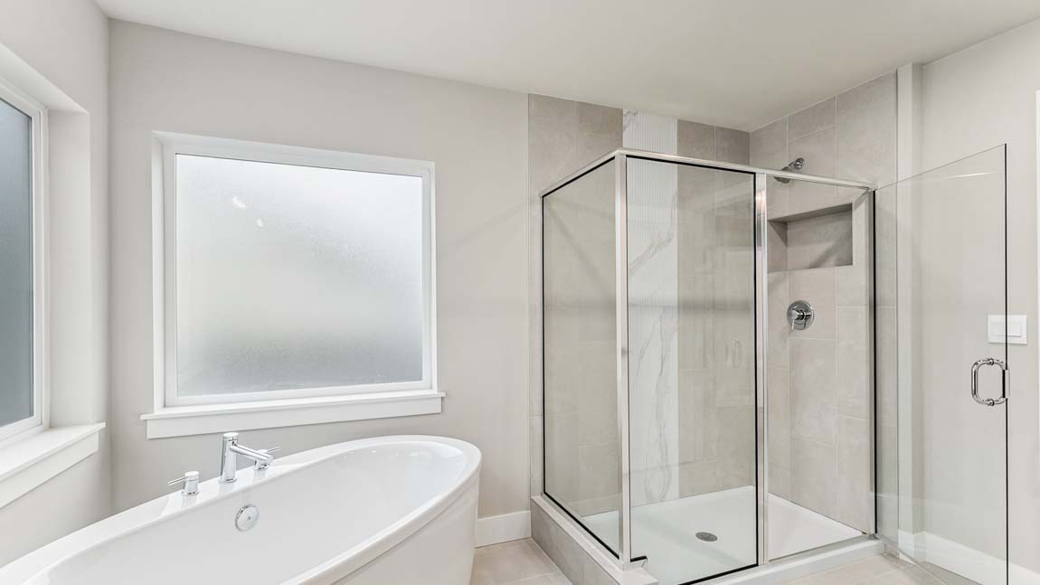 View of beautiful extra-large step in shower