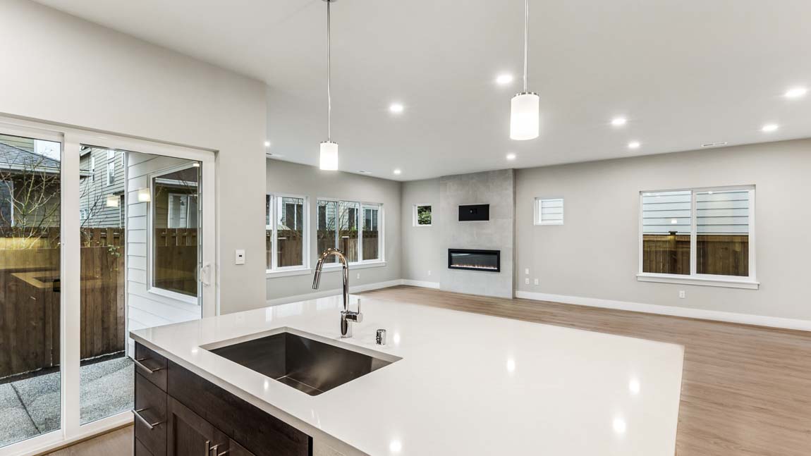 View from kitchen into dining and living space