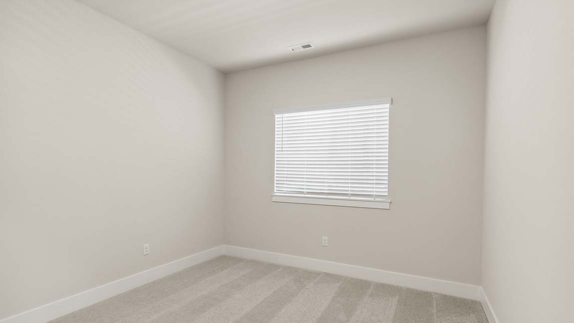 Main floor bedroom perfect for home office or additional bedroom