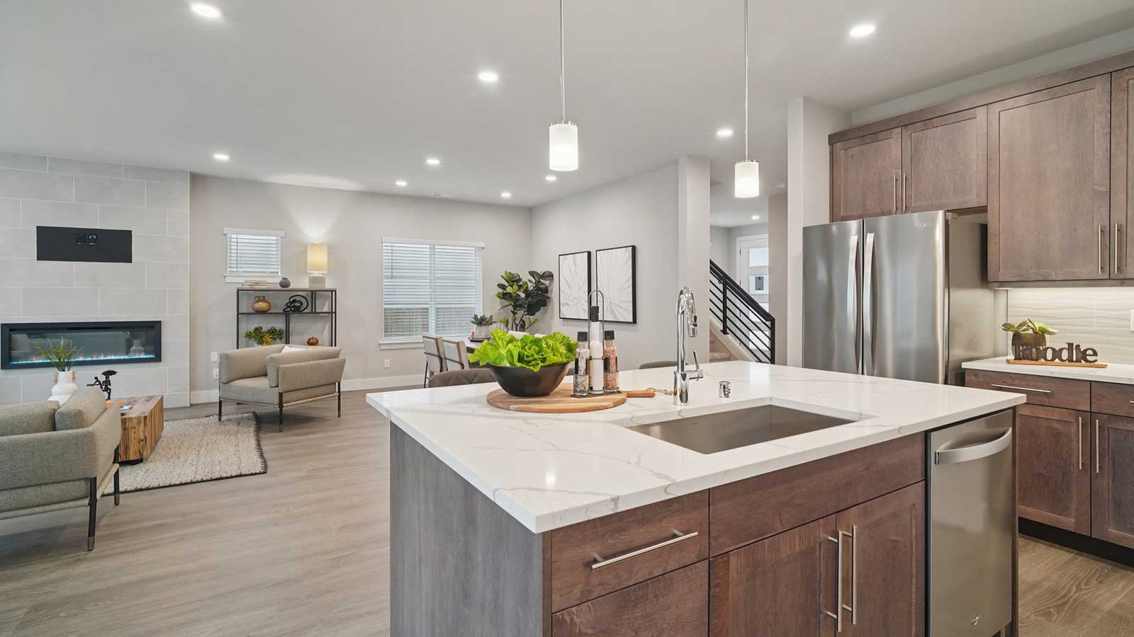 Large kitchen island with pendent lighting