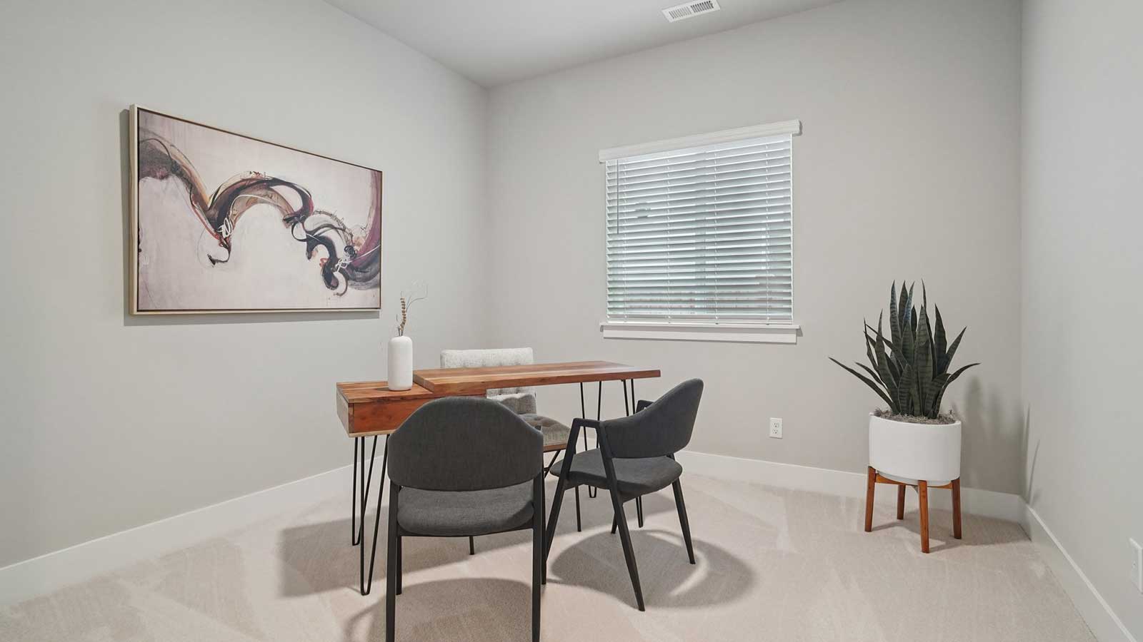 Main floor bedroom perfect for home office or additional bedroom