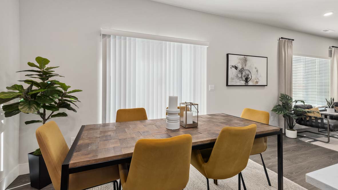 Dining nook with sliding glass door to outside featured in Newhalem plan