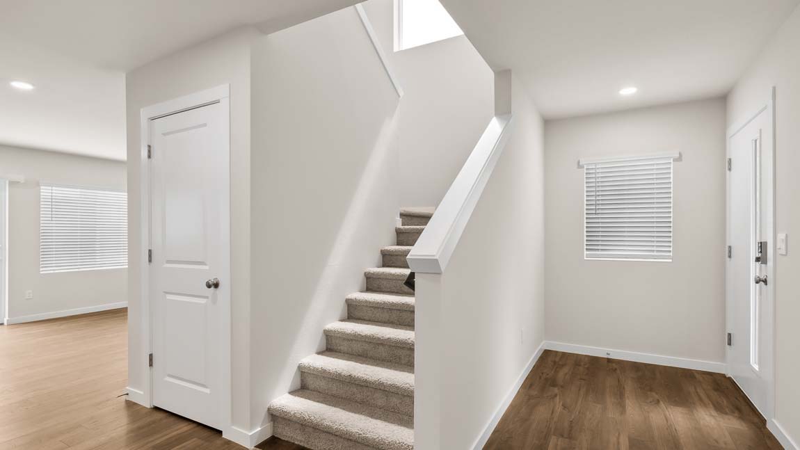 Entry showing access to staircase to upper floor with large Entry closet
