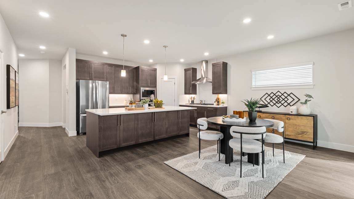 Open concept dining and kitchen areas