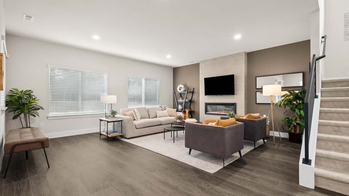 Dining room flowing into living space showcasing open concept living