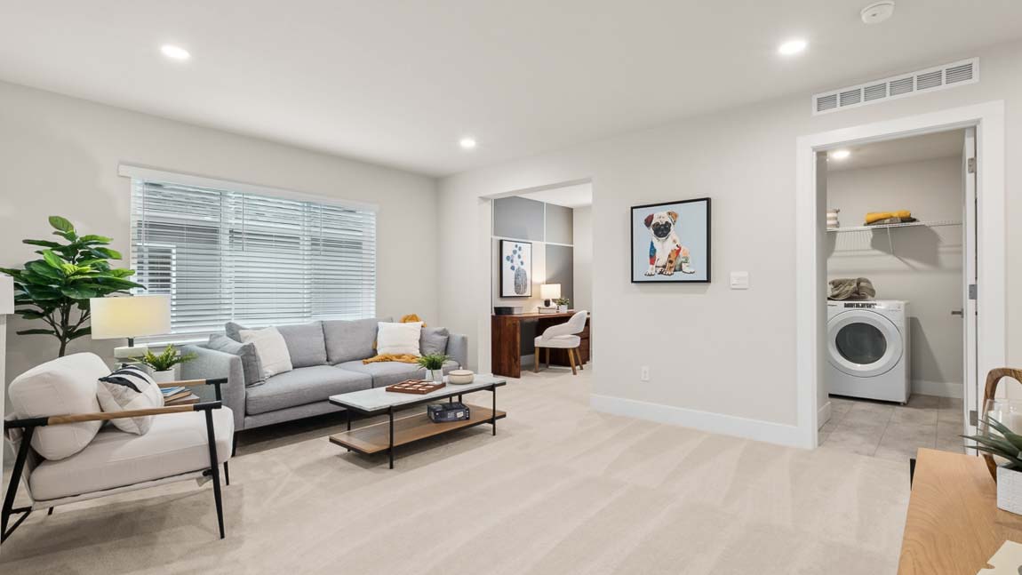 Upper floor multipurpose loft area near stairway access with adjoining tech room and easy access to laundry room