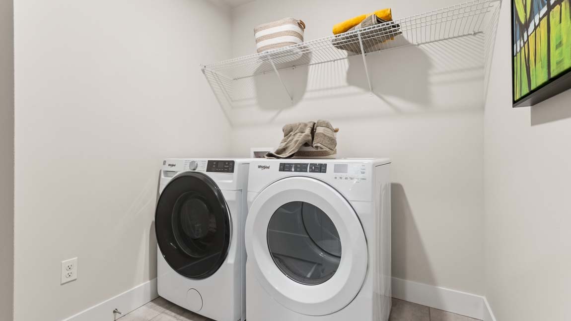 Upper floor multipurpose loft area near stairway access with adjoining tech room and easy access to laundry room