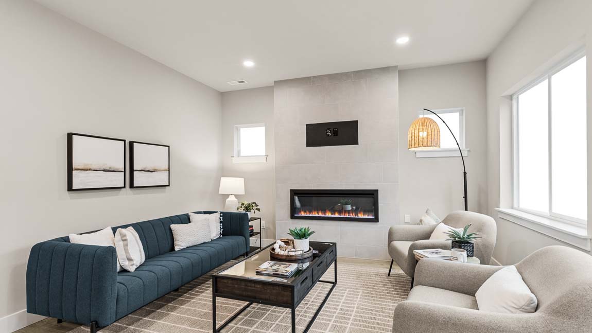 Gorgeous living room space with cozy electric fireplace