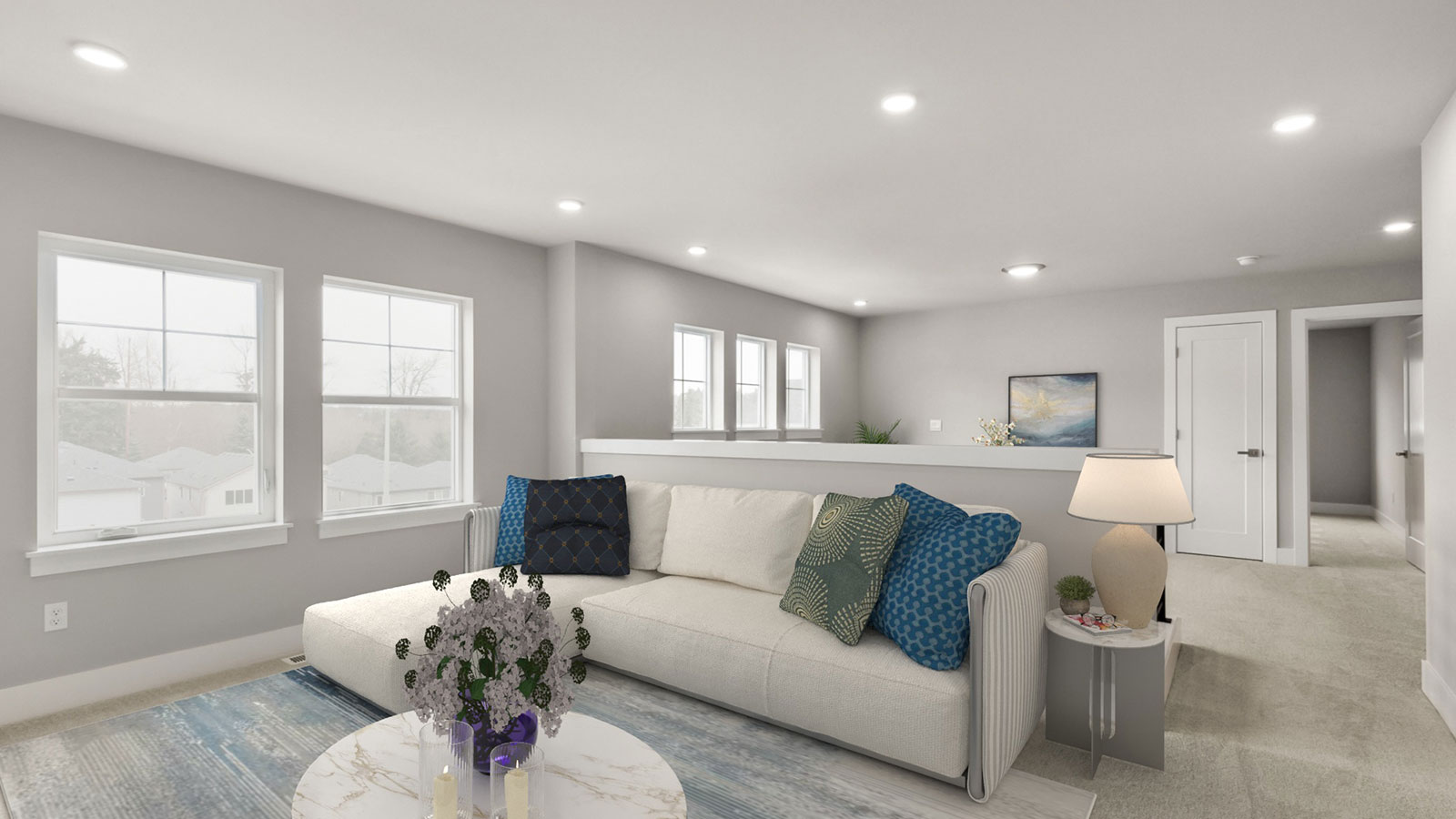 Loft space stages as a reading nook in the Tahoma floor plan