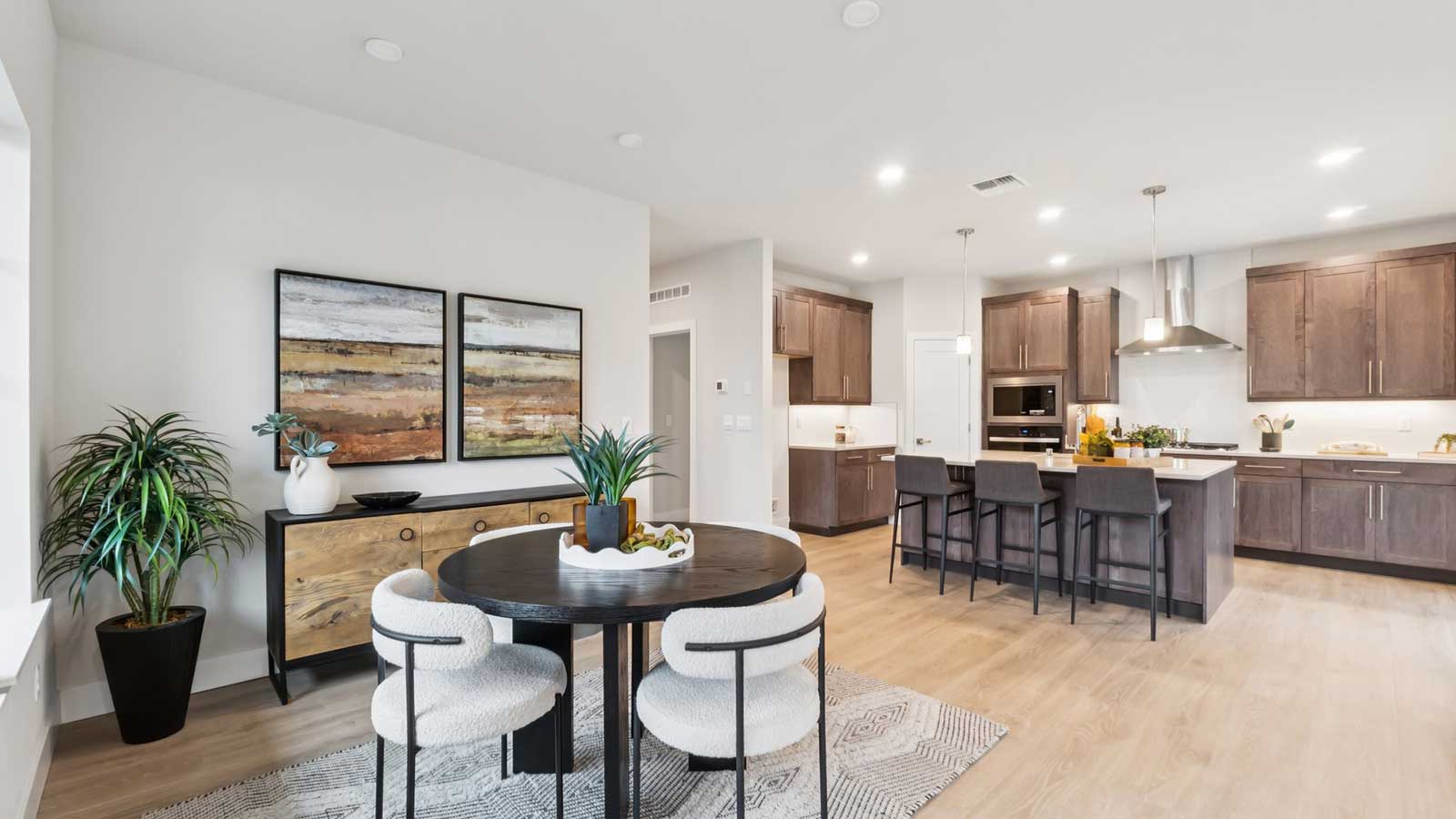 Dining space flowing into modern kitchen