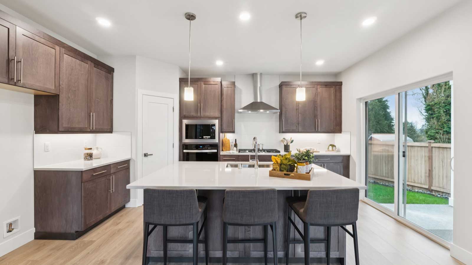 Gorgeous modern kitchen with access to the yard and ample storage