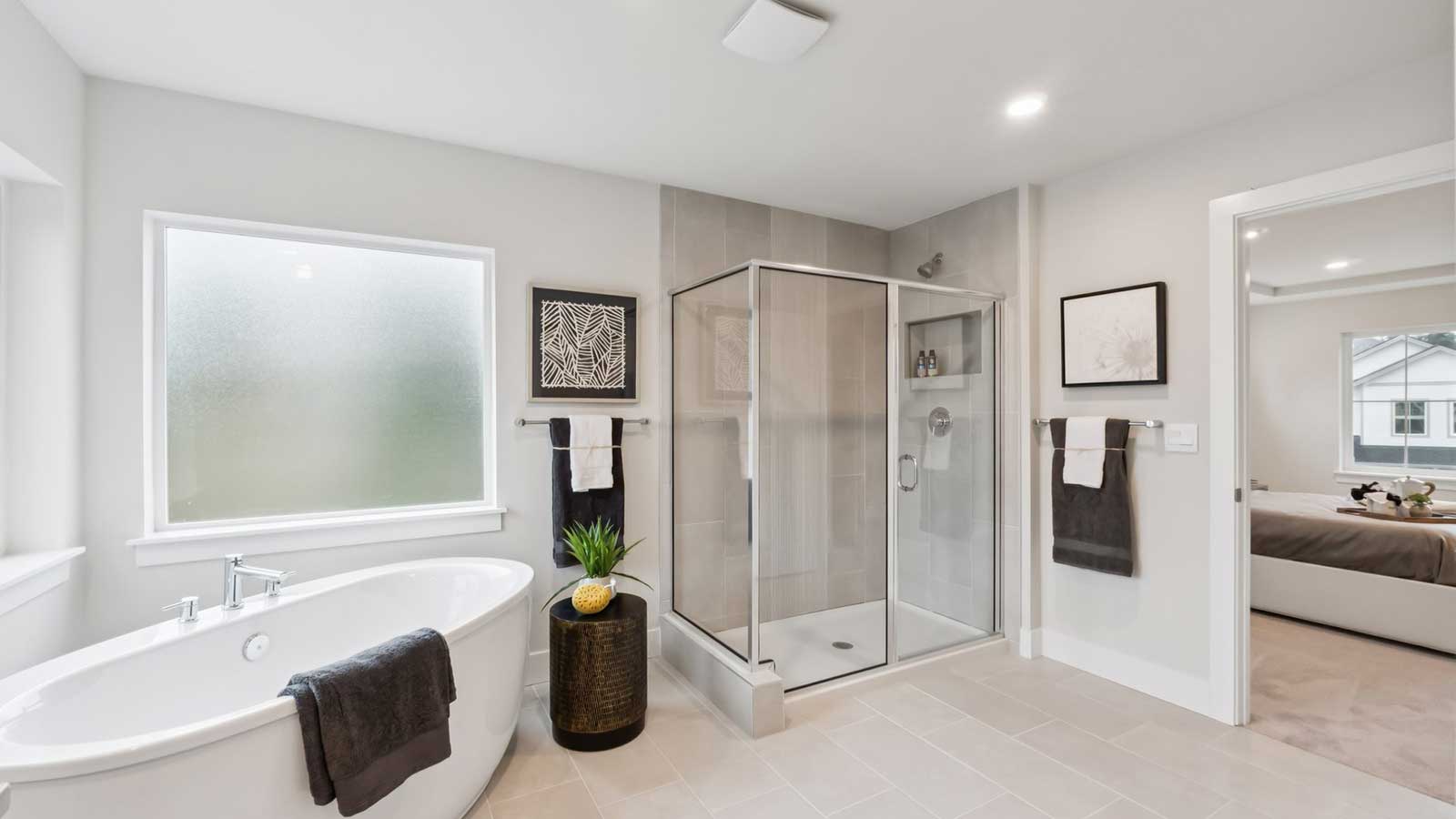 View of Expansive Step in shower in primary bathroom