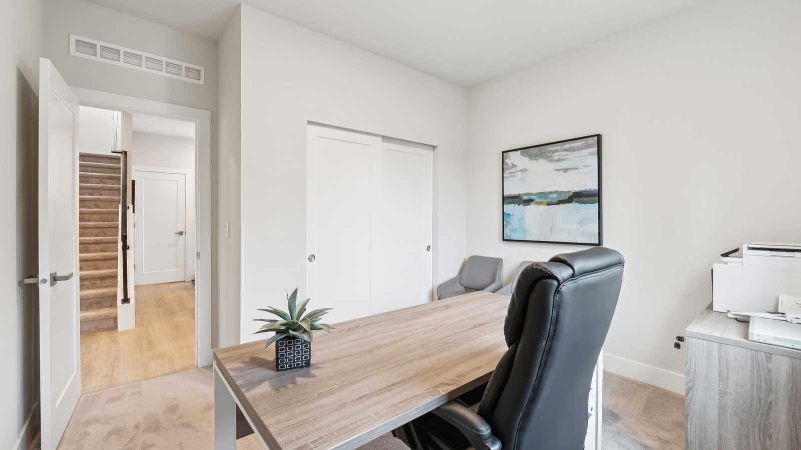 Main floor bedroom 5 staged as a home office