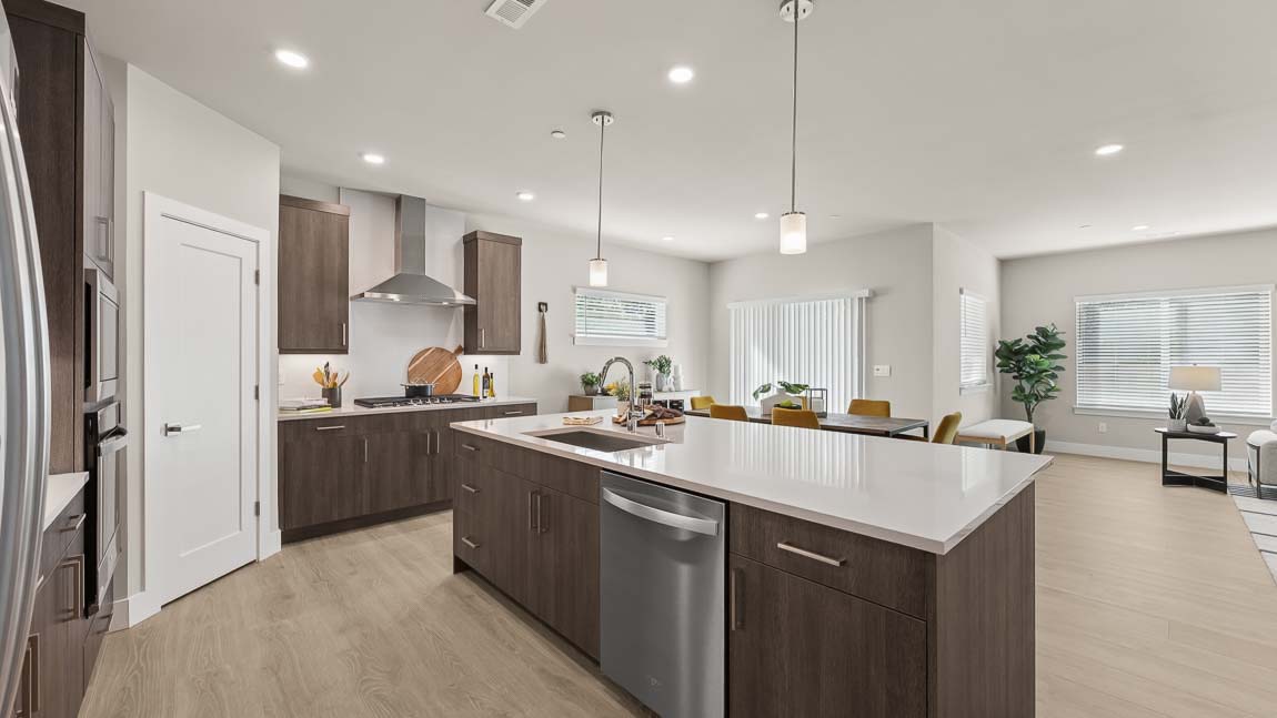 Outdoor access to covered patio near dining room and living room also showing stairway access to upper floor