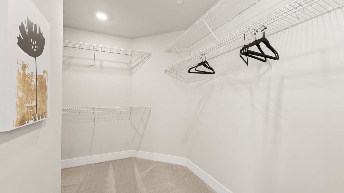 Oversized walk-in closet in the primary bedroom suite