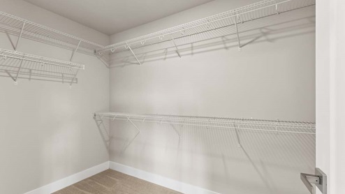 Large walk-in closet in primary bedroom