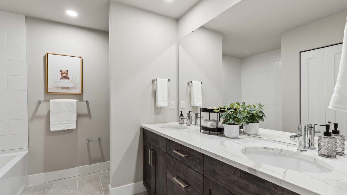 Hallway bathroom with shower tub combo upstairs