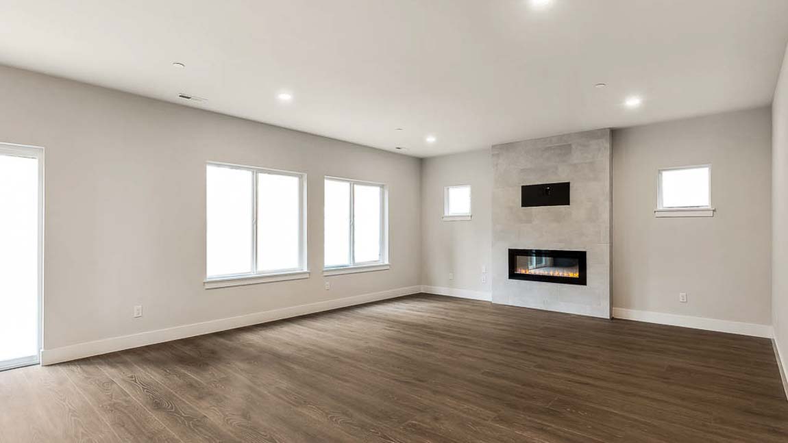 Large living room with cozy electric fireplace