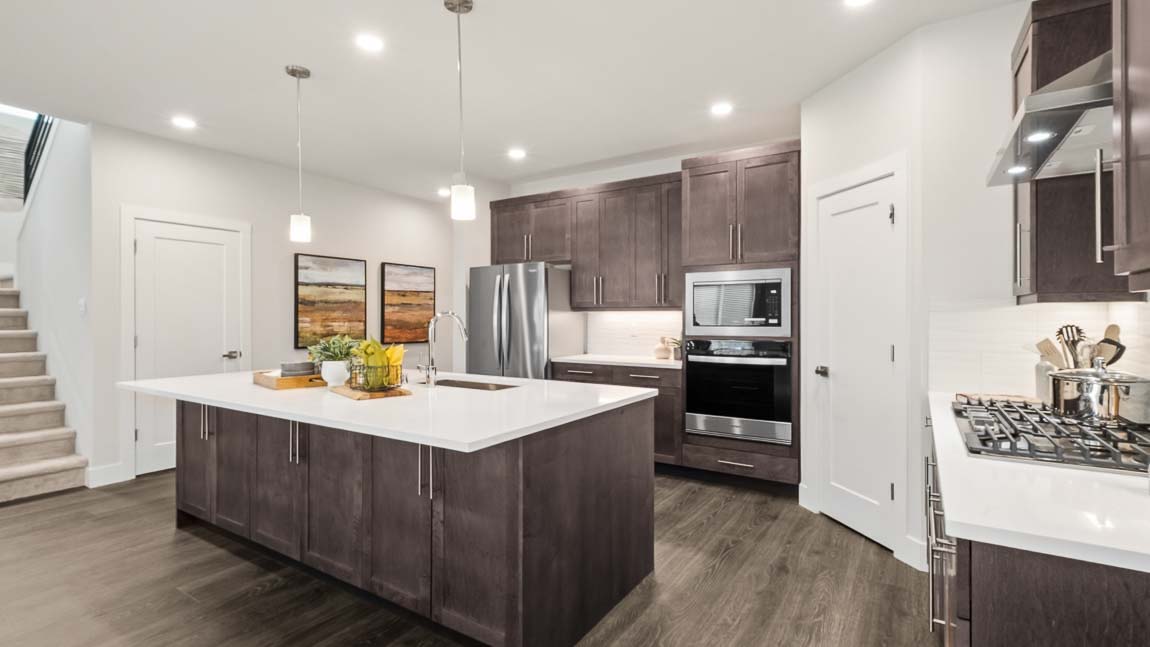 Stainless steel appliances in this modern kitchen