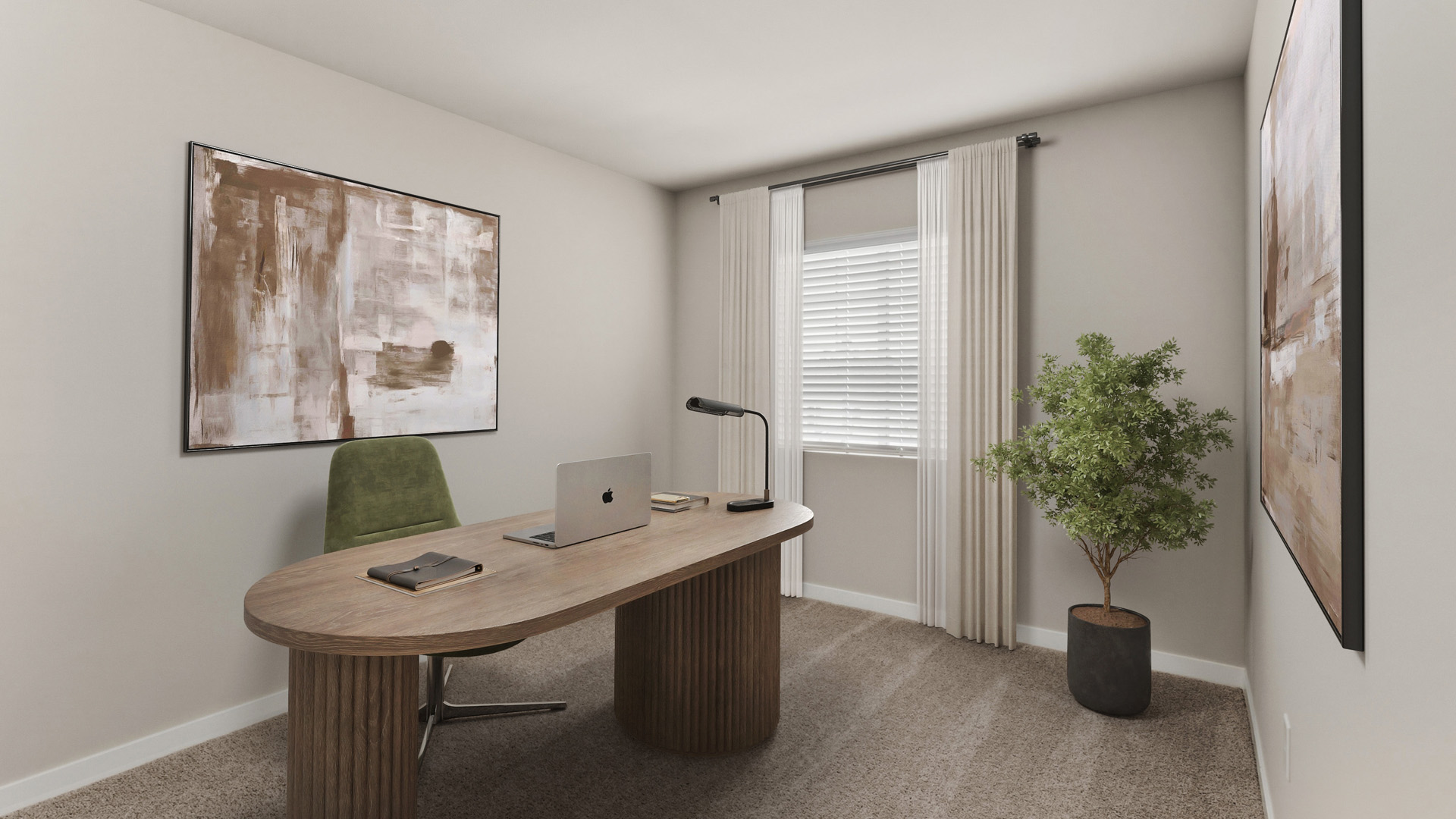 Home office with a curved wood desk, open laptop, green desk chair, black task lamp, potted tree, curtained window, and large abstract artwork.