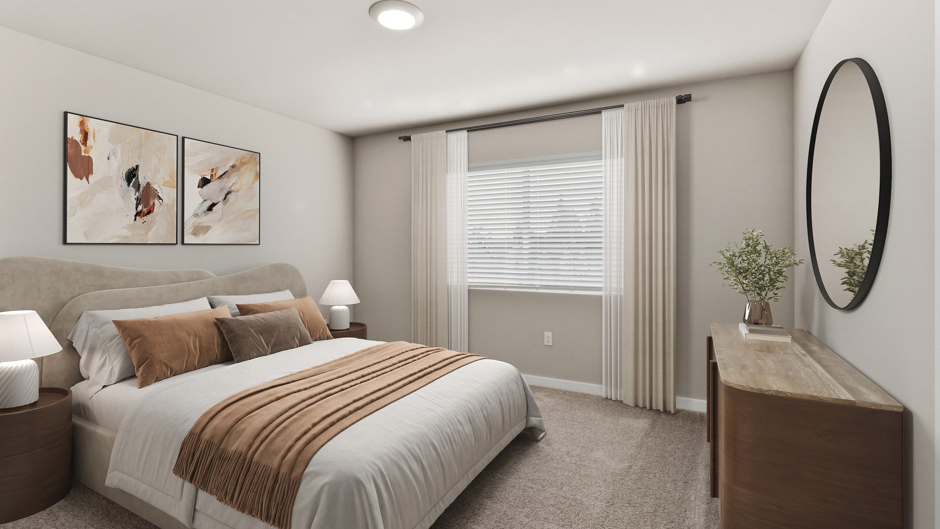 Neutral bedroom with an upholstered bed, white bedding, tan throw and pillows, two bedside lamps, a wood dresser, round mirror, and curtained window.