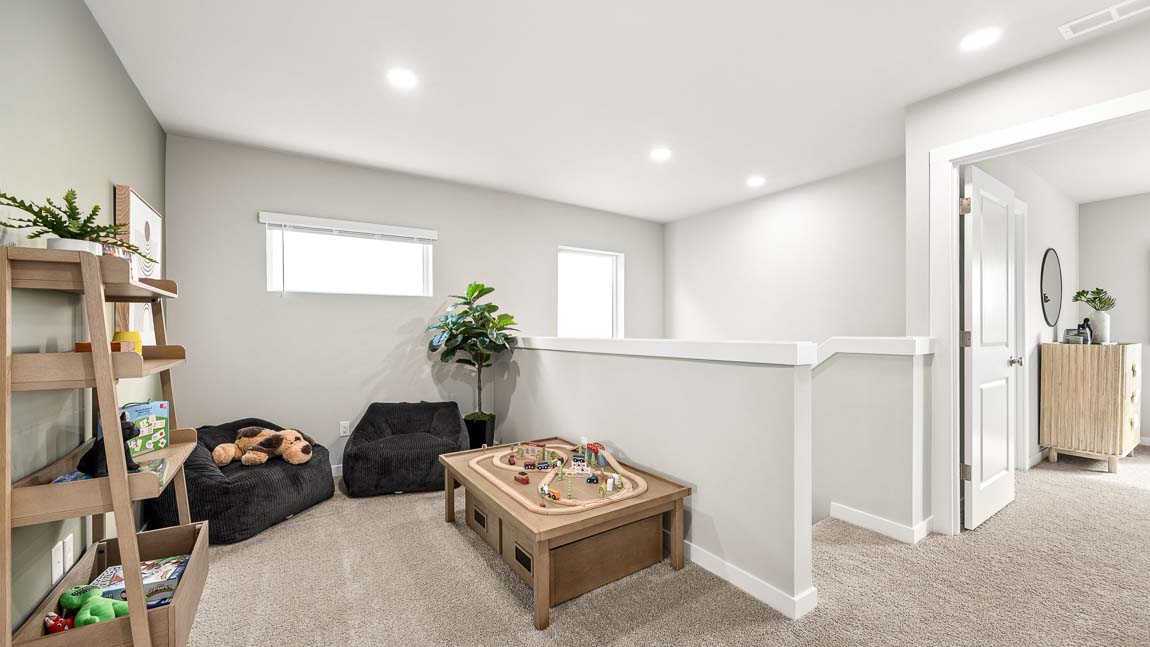 Loft area at top of the stairs on the upper level