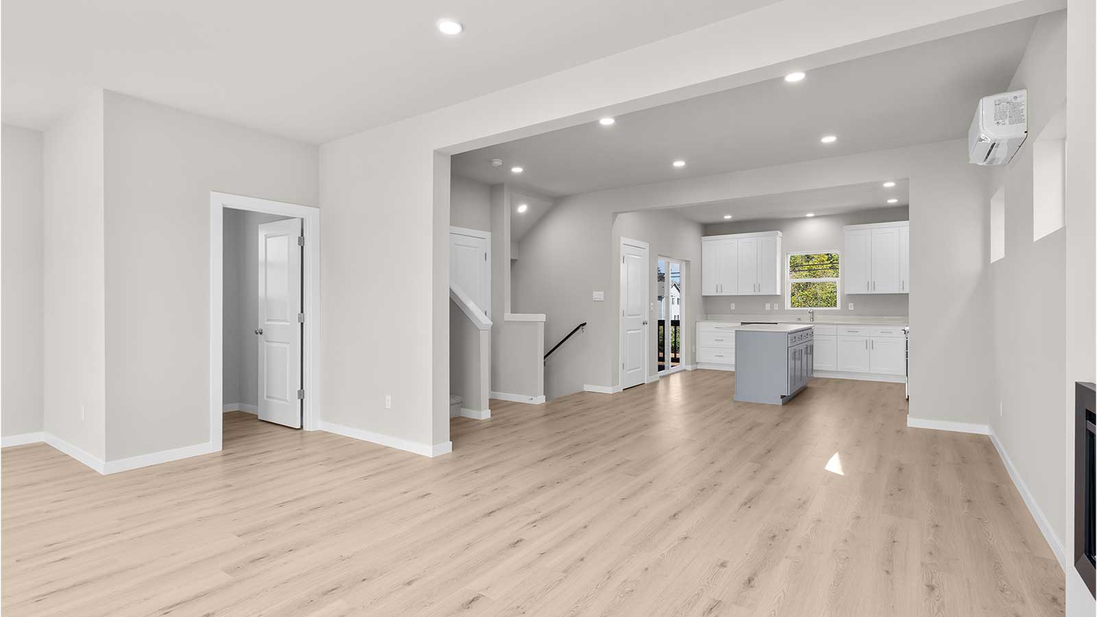 View from living room into dining and kitchen