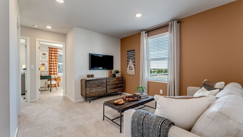 Loft area with wall-to-wall carpet