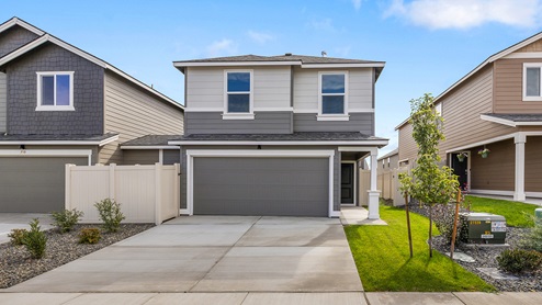 rowan exterior front attached single family home with extended 2-car garage