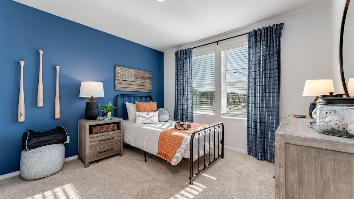 Bedroom with wall-to-wall carpet and a closet