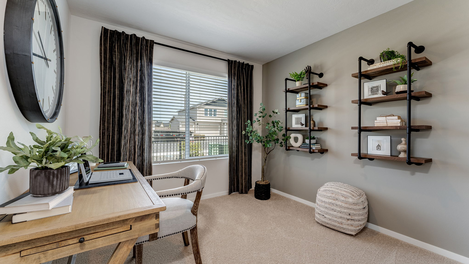 Bedroom with wall-to-wall carpet and a closet