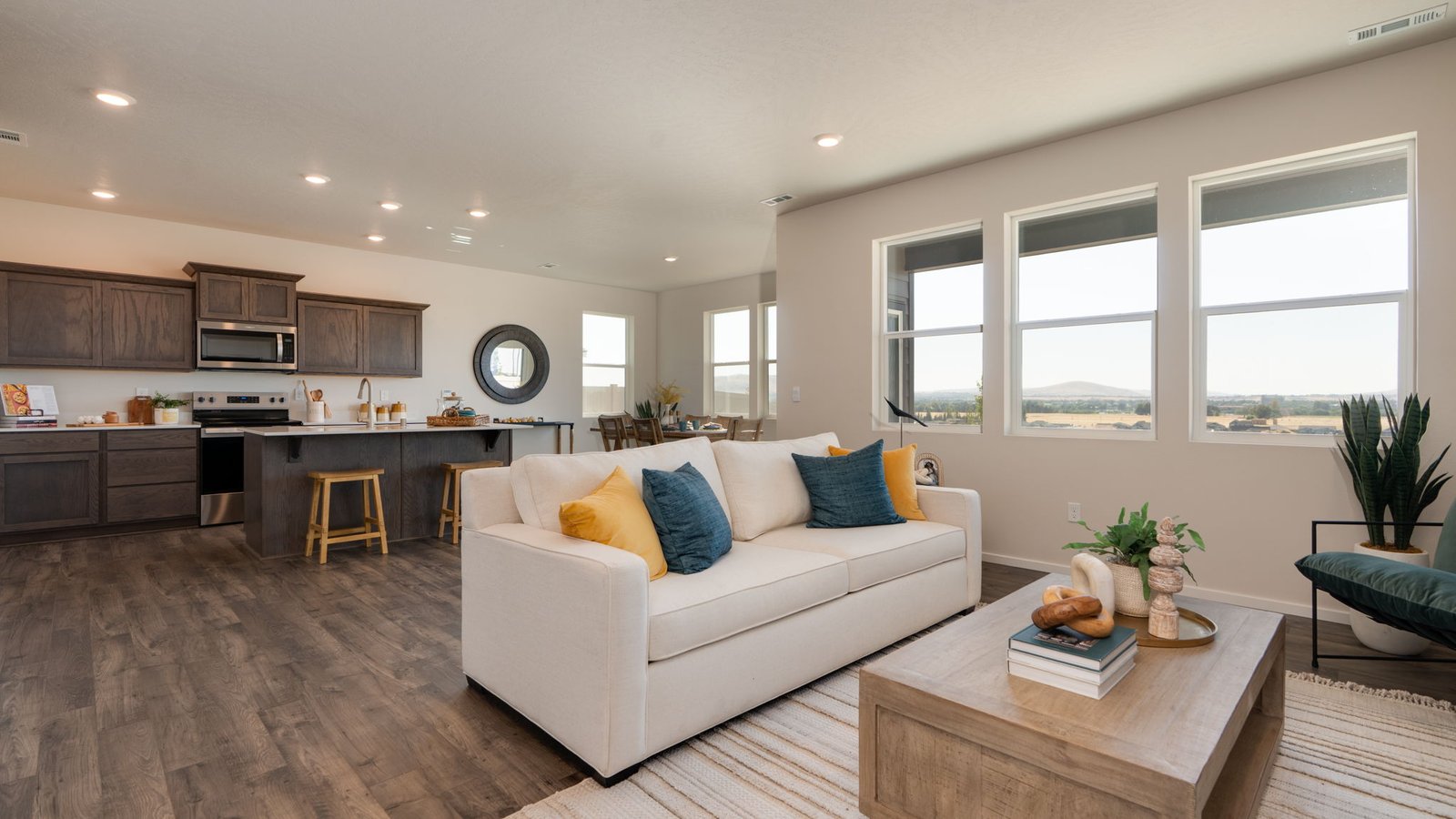 Great room with laminate flooring and an electric fireplace