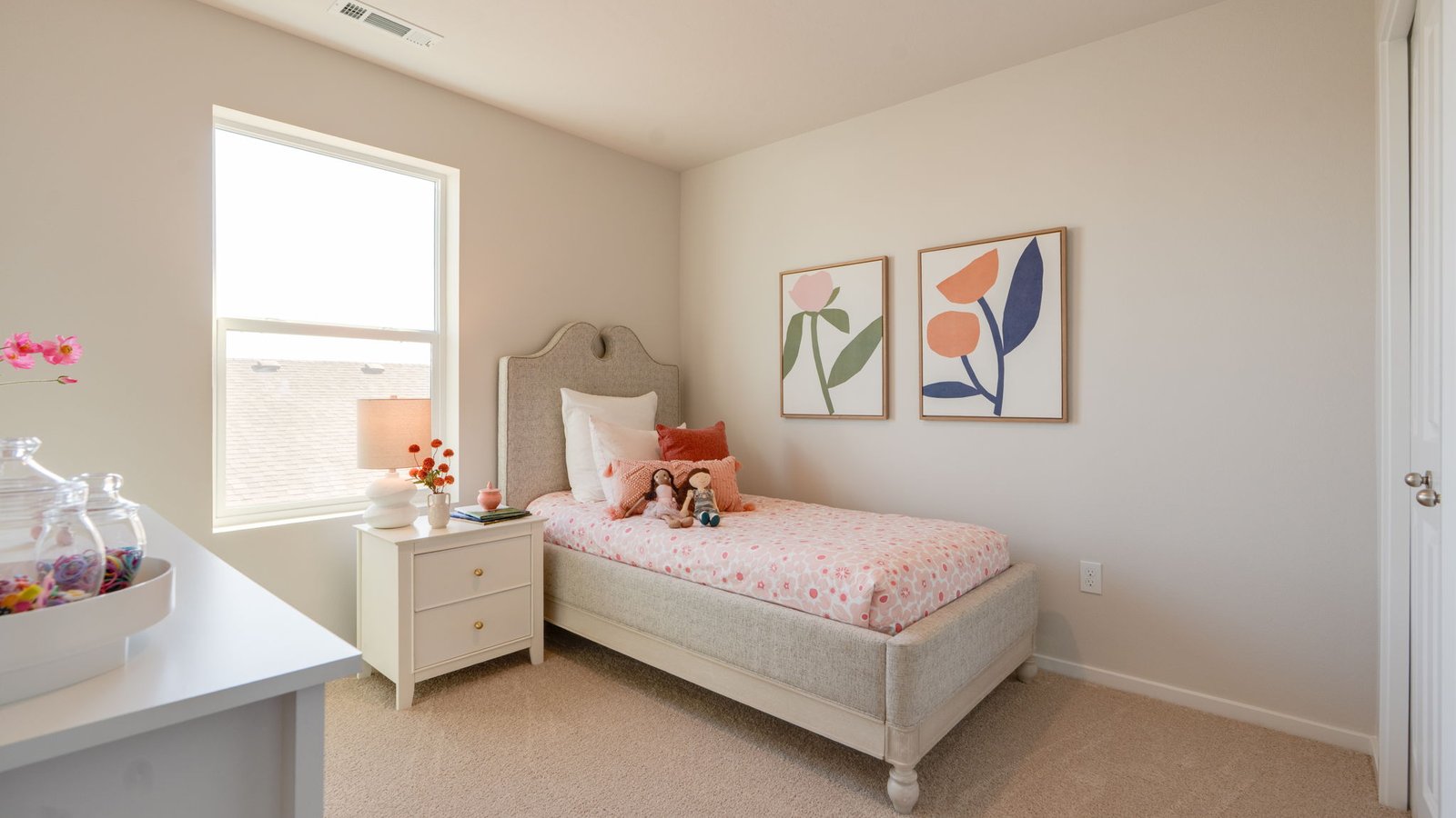 Bedroom with wall-to-wall carpet and a closet