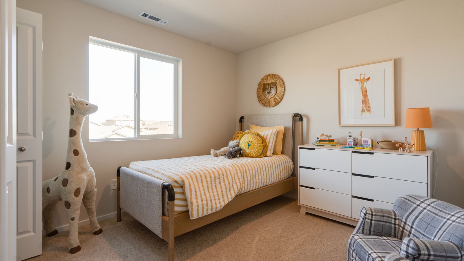 Bedroom with wall-to-wall carpet and a closet