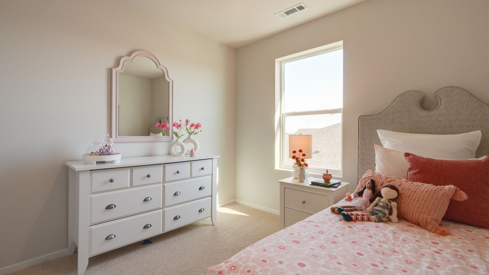 Bedroom with wall-to-wall carpet and a closet