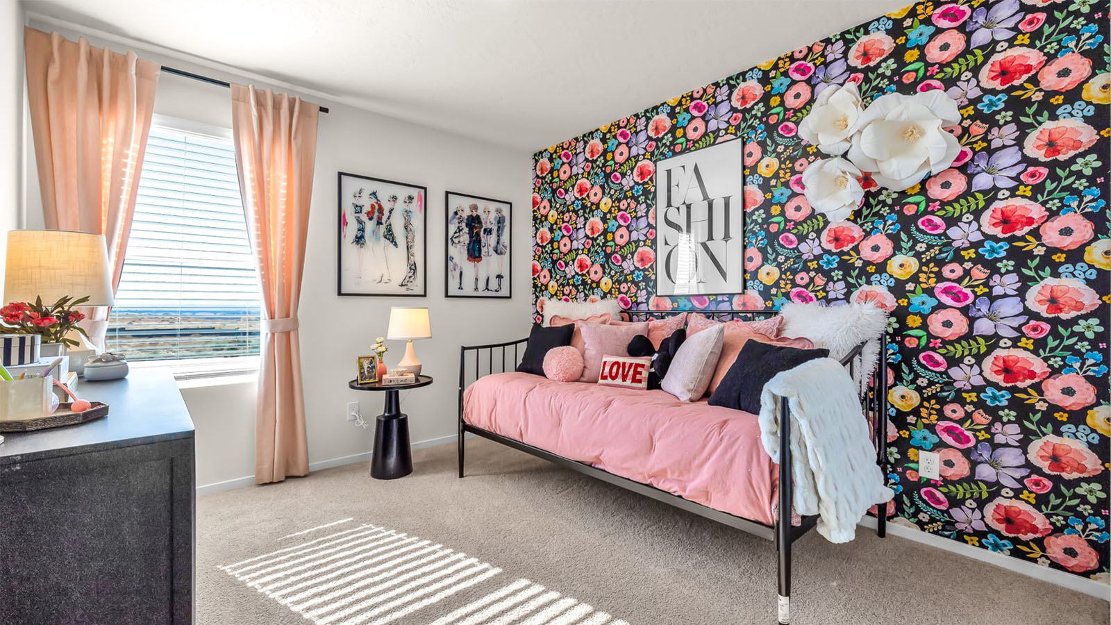 Bedroom with wall-to-wall carpet and a closet